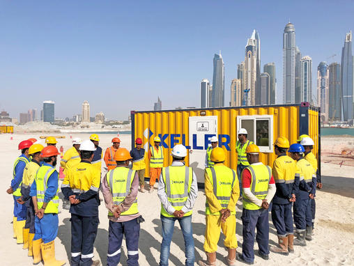 Keller site team at daily kick-off meeting on Dubai Harbour project